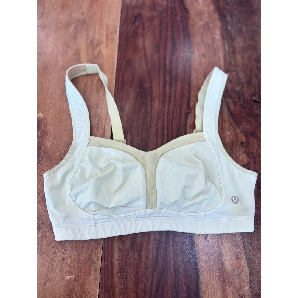 Lululemon sports bra women size 34C pale yellow high impact ta ta tamer
